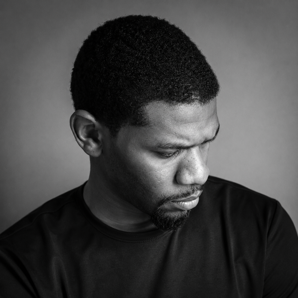 Portrait of the author, looking down in thought
